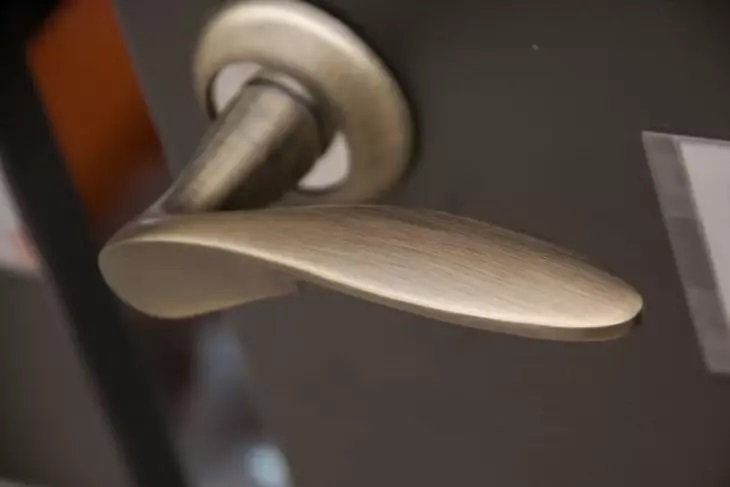 What does knocking on a door or window at night mean, according to popular belief? Door